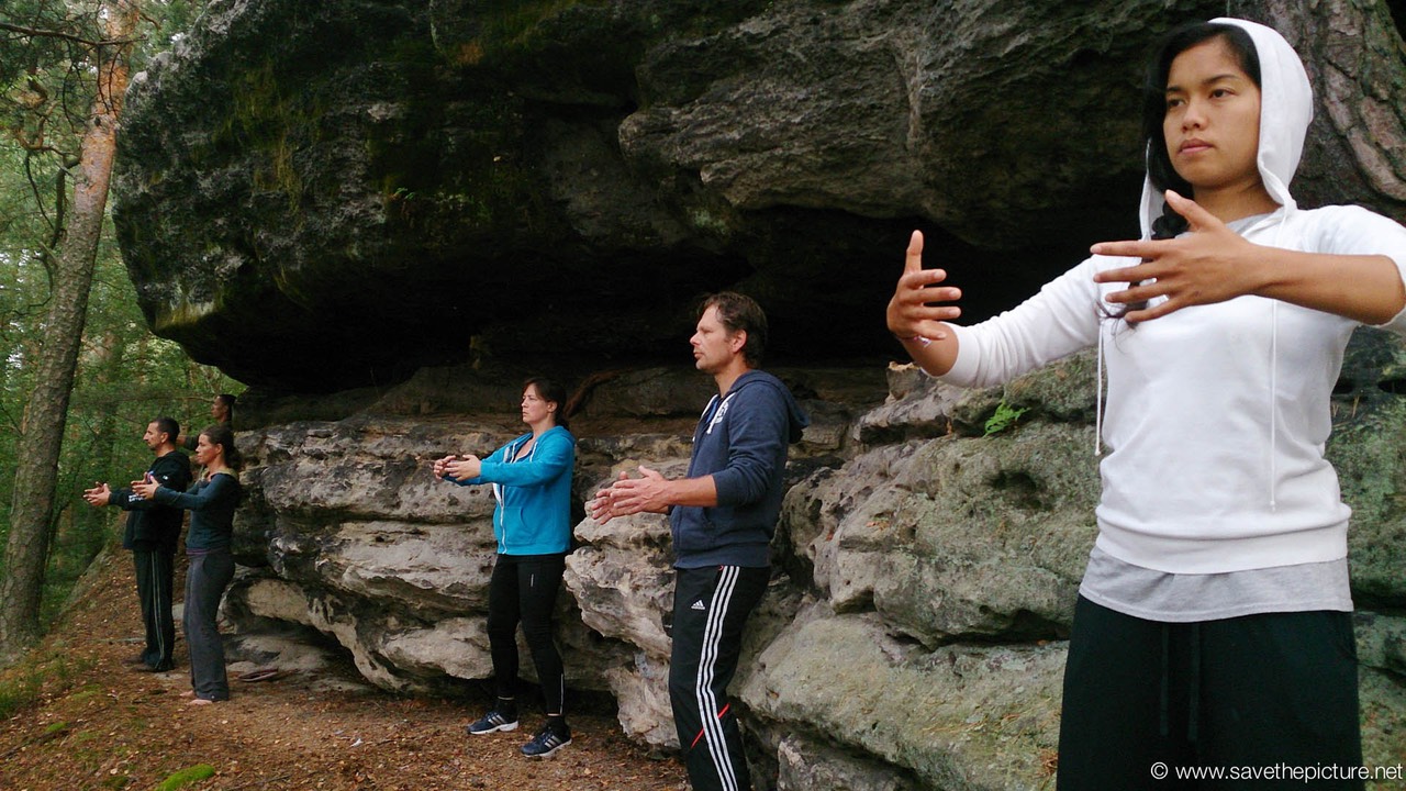 Taikiken standing active in stillness on the ridge